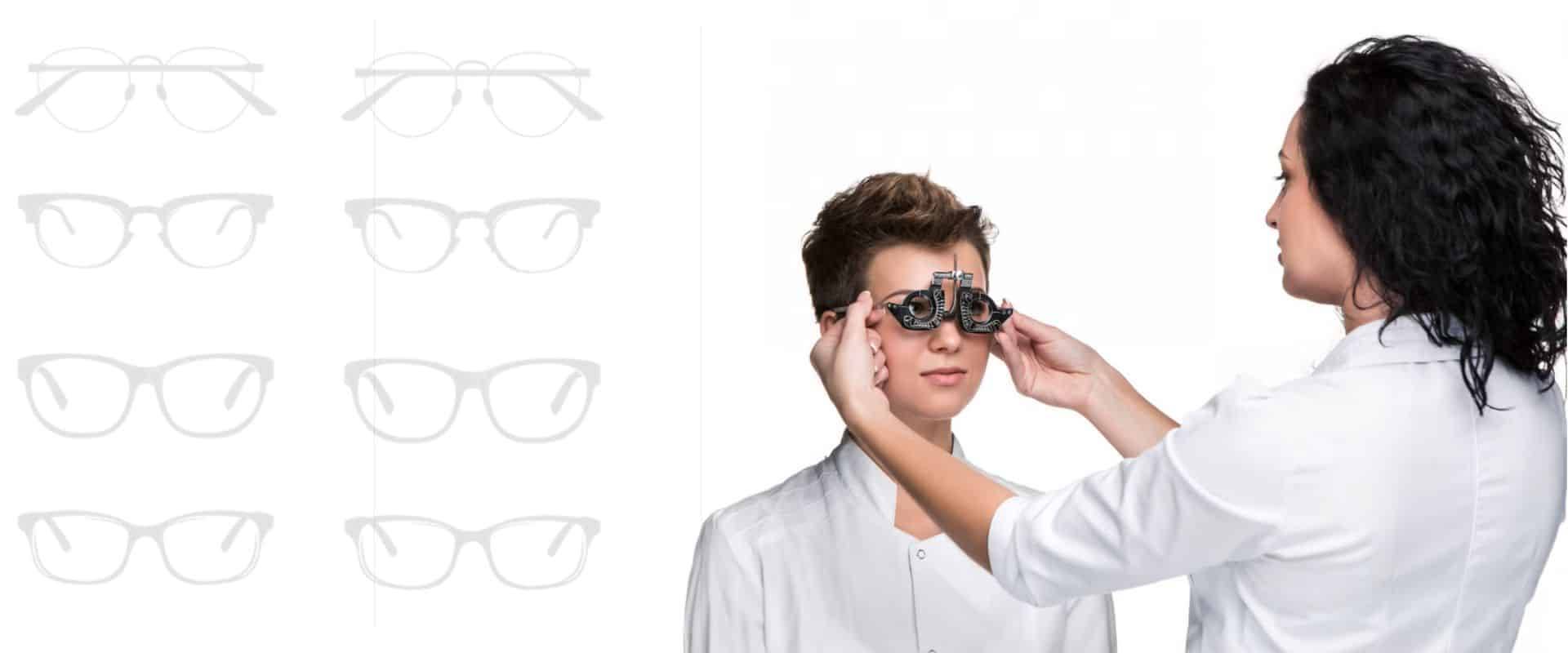 optician adjusting spectacles on a young boy optician adjusting spectacles on a young boy